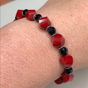 3/$20 Red and black helix glass bracelet. (A1032)